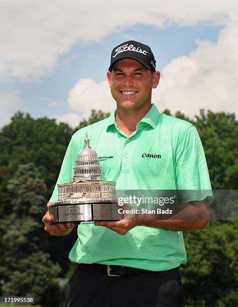 Bill Haas poses with the trophy after winning the AT&T National at Congressional Country Club on June 30, 2013 in Bethesda, Maryland.