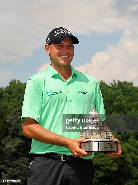 Bill Haas poses with the trophy after winning the AT&T National at Congressional Country Club on June 30, 2013 in Bethesda, Maryland.