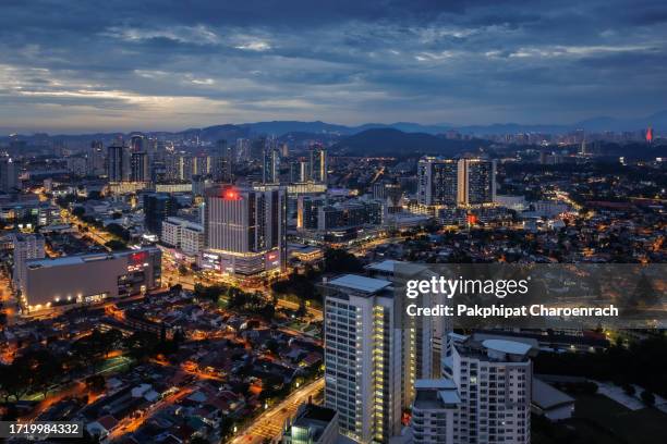 aerial view skyscraper of downtown petaling jaya hotels, malaysia during sunset. - petaling jaya stock pictures, royalty-free photos & images