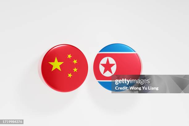 china and north korea flag,3d render - malaysia north korea crisis ストックフォトと画像