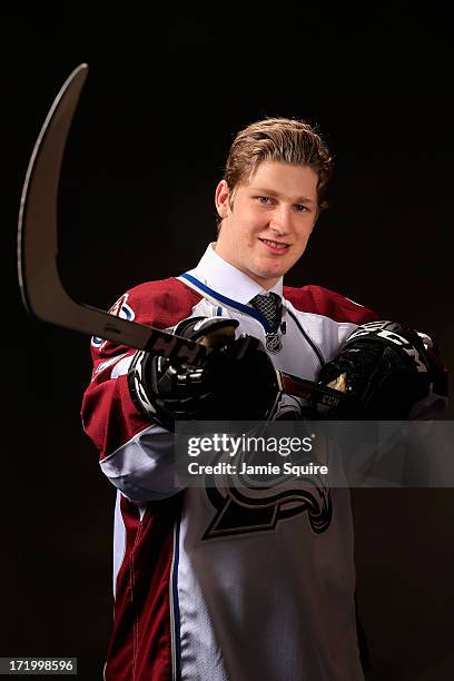 Nathan Mackinnon poses for a portrait after being selected number one overall in the first round by the Colorado Avalanche during the 2013 NHL Draft...