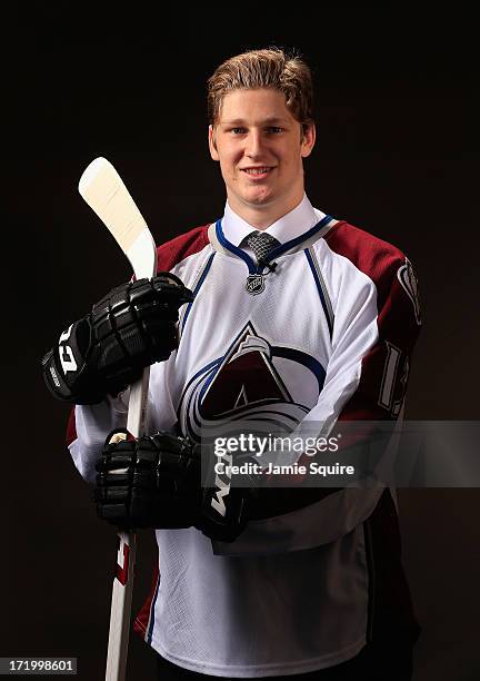 Nathan Mackinnon poses for a portrait after being selected number one overall in the first round by the Colorado Avalanche during the 2013 NHL Draft...
