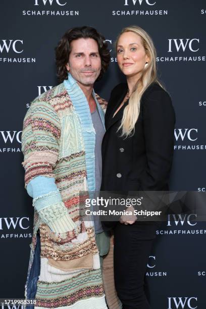Greg Lauren and Elizabeth Berkley attend the IWC Schaffhausen Rodeo flagship re-opening at IWC Boutique on October 05, 2023 in Beverly Hills,...