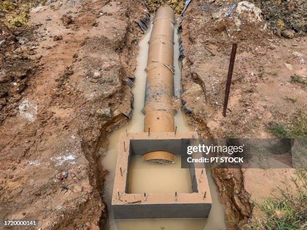 unfinished sewer pipe - trench safety stock pictures, royalty-free photos & images