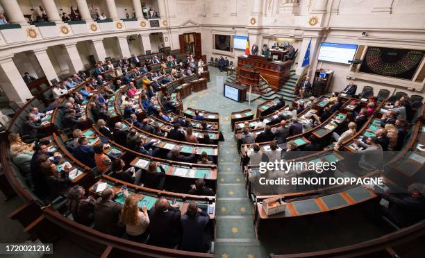 Members of the Chamber of Representatives of Belgium attend a plenary session of the chamber, at the federal parliament in Brussels, on October 12,...