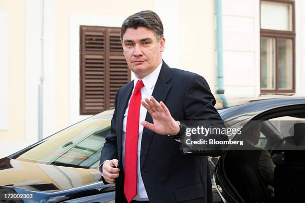 Zoran Milanovic, Croatia's prime minister, gestures to the media as he arrives for a group photograph in St. Marks Square as part of the celebrations...