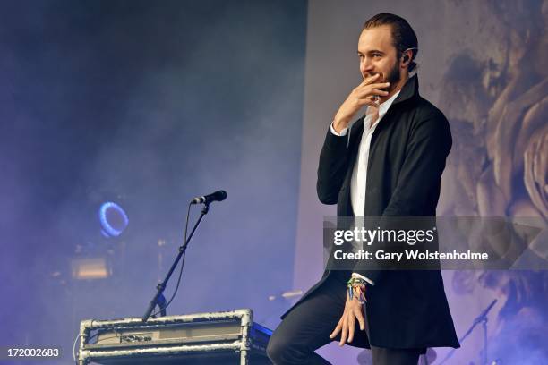 Tom Smith of Editors performs on stage on Day 4 of Glastonbury Festival at Worthy Farm on June 30, 2013 in Glastonbury, England.