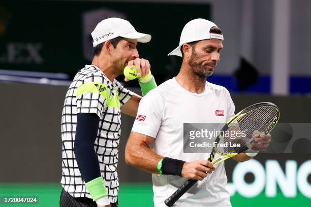 Jean-Julien Rojer of the Netherlands and Marcelo Arevalo of El Salvador in action match against Rohan Bopanna of India and Matthew Ebden of Australia...