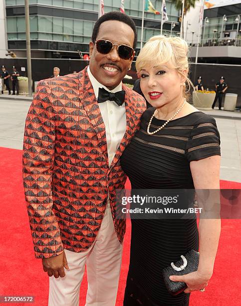 Singer Charlie Wilson and wife Mahin Tat attend the Ford Red Carpet at the 2013 BET Awards at Nokia Theatre L.A. Live on June 30, 2013 in Los...