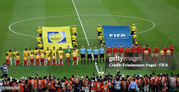 The Brazil and Spain players lineup for the anthems prior to the FIFA Confederations Cup Brazil 2013 Final match between Brazil and Spain at Maracana...