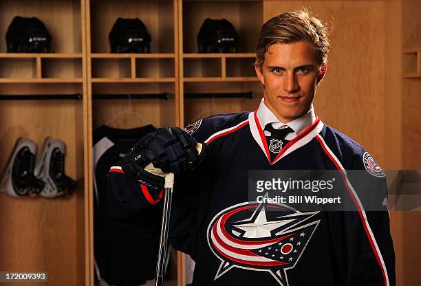 Alexander Wennberg, 14th overall pick by the Columbus Blue Jackets, poses for a portrait during the 2013 NHL Draft at Prudential Center on June 30,...