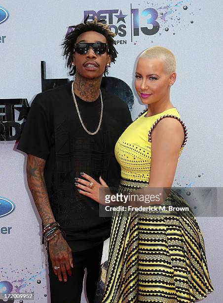Rapper Wiz Khalifa and model Amber Rose attend the 2013 BET Awards at Nokia Theatre L.A. Live on June 30, 2013 in Los Angeles, California.