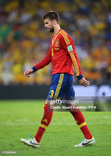 Gerard Pique of Spain heads for the dressing room after being sent off for a tackle on Neymar of Brazil during the FIFA Confederations Cup Brazil...