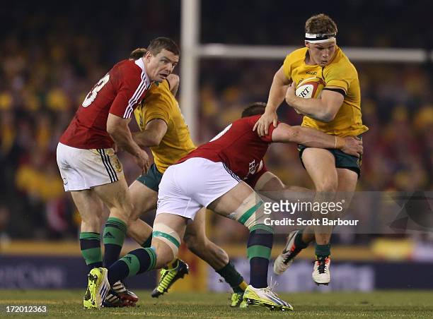 Michael Hooper of the Wallabies runs with the ball during game two of the International Test Series between the Australian Wallabies and the British...