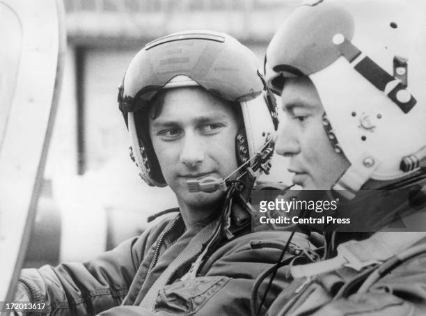 Prince Philippe of Belgium, seen here on a training flight with his instructor, Michel Audrit, as he trains as a pupil at the Pilot School of the...