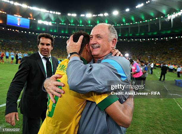 Luiz Felipe Scolari head coach of Brazil embraces Neymar of Brazil at the end of the FIFA Confederations Cup Brazil 2013 Final match between Brazil...