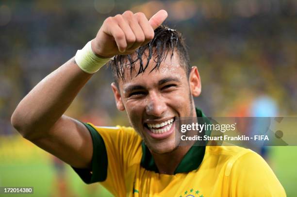 Neymar of Brazil celebrates at the end of the FIFA Confederations Cup Brazil 2013 Final match between Brazil and Spain at Maracana on June 30, 2013...