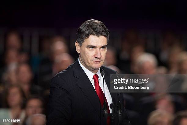 Zoran Milanovic, Croatia's prime minister, speaks on the stage in Ban Jelacic square as the Croatian capital celebrates its entry into the European...
