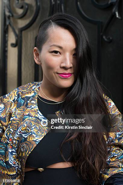Fashion stylist and writer Tina Leung wears a Versus dress and a Kenzo jacket on day 4 of Paris Collections: Men on June 29, 2013 in Paris, France.