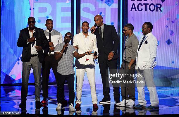 Actors JB Smoove, Columbus Short, Kevin Hart, Nick Cannon, Boris Kodjoe, Nelly, and Bobby Brown present an award onstage during the 2013 BET Awards...