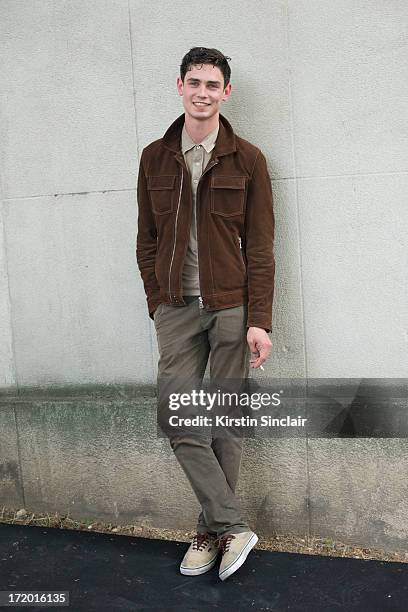 Model Arthur Gosse wears The Kooples jacket, Ralph Lauren shirt, Massimo Dutti trousers and Vans shoes on day 4 of Paris Collections: Men on June 29,...