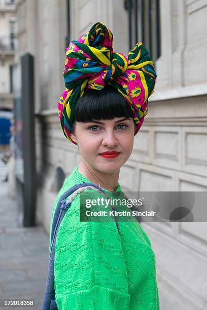 Fashion Student Abbie Stirrup wears a Cow sweater and a head scarf from Istanbul on day 3 of Paris Collections: Men on June 28, 2013 in Paris, France.