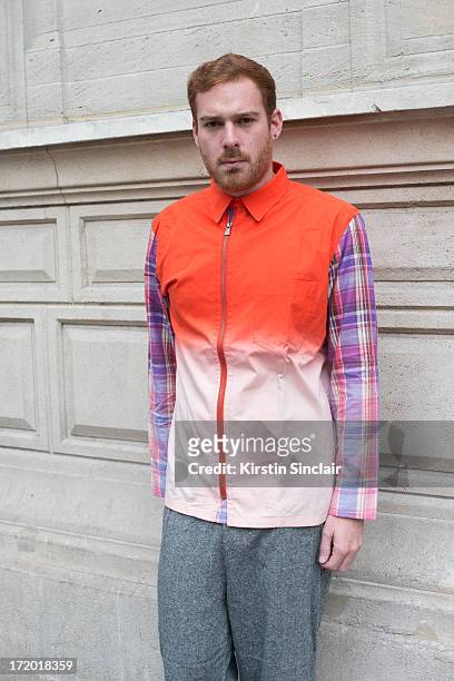 Fashion Consultant Lorenzi Damian wears an Issey Miyake shirt and vintage trousers on day 3 of Paris Collections: Men on June 28, 2013 in Paris,...