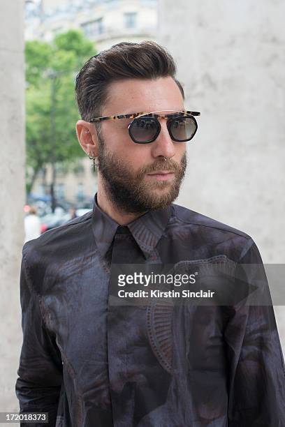 Fashion Writer Andrea Adamon wears Prada glasses, Givenchy shirt on day 3 of Paris Collections: Men on June 28, 2013 in Paris, France.