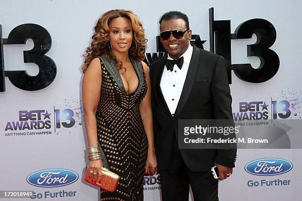 Musician Ronald Isley and Kandy Isley attend the 2013 BET Awards at Nokia Theatre L.A. Live on June 30, 2013 in Los Angeles, California.