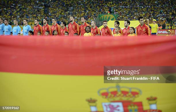 Spain players listen to the Brazilian anthem prior to the FIFA Confederations Cup Brazil 2013 Final match between Brazil and Spain at Maracana on...