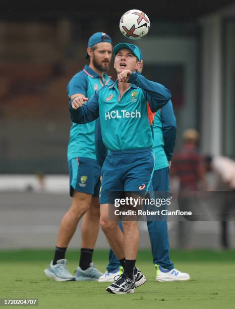 Adam Zampa of Australia heads the ball during an Australian training session during the ICC Men's Cricket World Cup India 2023 at at M. A....