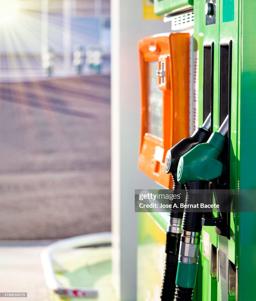 Close-Up of fuel pumps at gas station, diesel and unleaded gasoline.