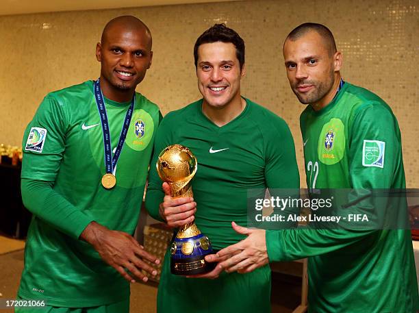 Brazilian goalkeepers Jefferson, Julio Cesar and Diego Cavalieri of Brazil pose with the FIFA Confederations Cup trophy after the FIFA Confederations...