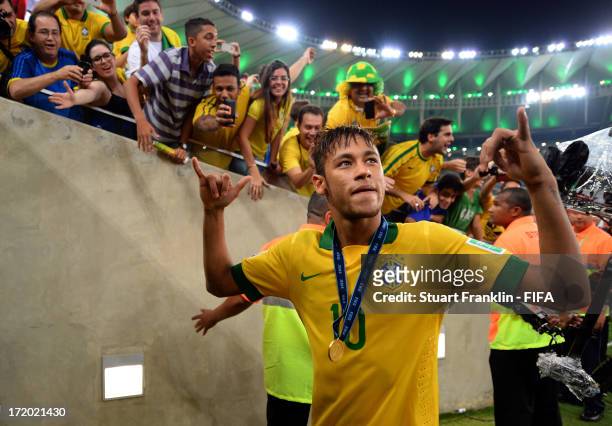 Neymar of Brazil leaves the field after the FIFA Confederations Cup Brazil 2013 Final match between Brazil and Spain at Maracana on June 30, 2013 in...