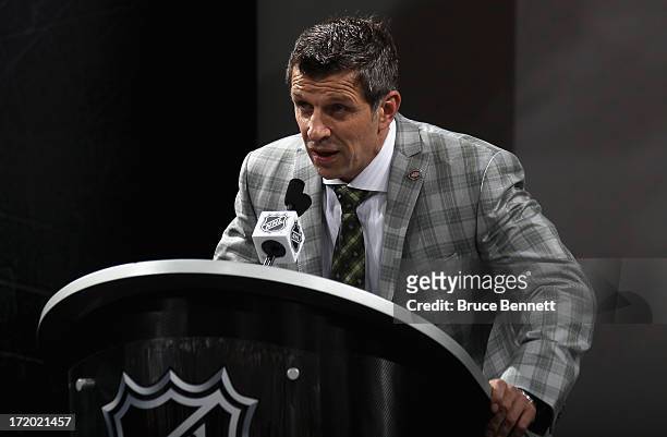 Executive Vice President and General Manager Marc Bergevin of the Montreal Canadiens speaks at the podium during the 2013 NHL Draft at the Prudential...