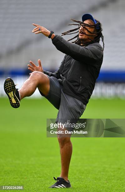 Fa'alogo Tana Umaga, Assistant Coach of Samoa kicks during the Captain's Run ahead of their Rugby World Cup France 2023 match against England at...