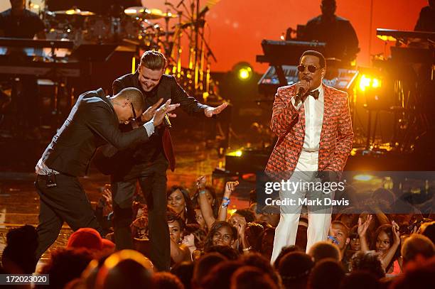 Recording artists Pharrell Williams, Justin Timberlake, and Charlie Wilson perform onstage during the 2013 BET Awards at Nokia Theatre L.A. Live on...