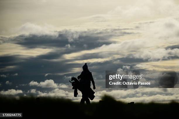 General view as a caddie walks across the 11th green during Day Two of the Alfred Dunhill Links Championship at the Old Course St. Andrews on October...