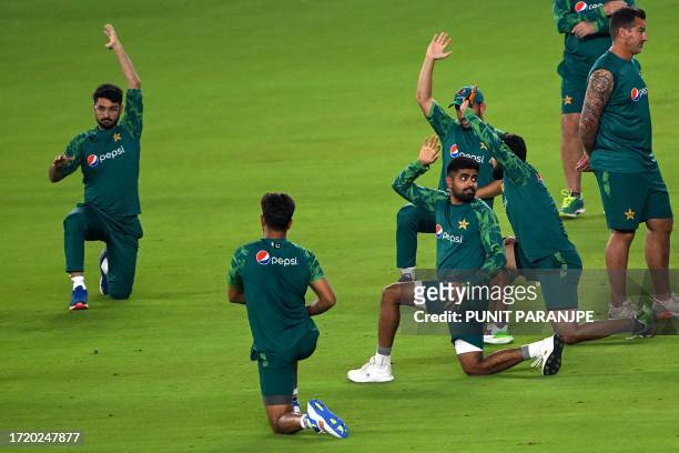Pakistan's players attend a practice session ahead of the 2023 ICC Men's Cricket World Cup one-day international match between India and Pakistan at...