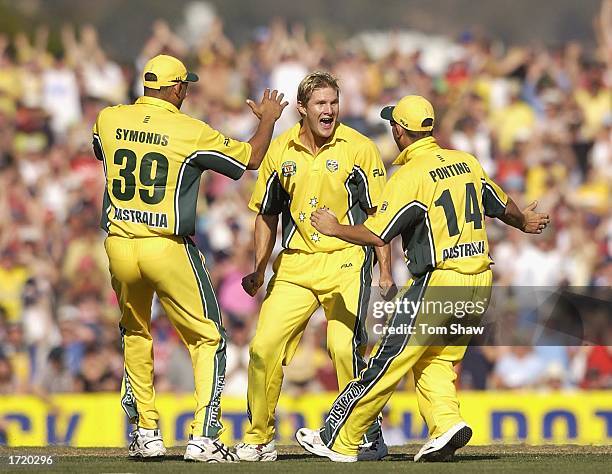 Shane Watson of Australia celebrates after taking the wicket of Nasser Hussain of England during the One Day International match between Australia...