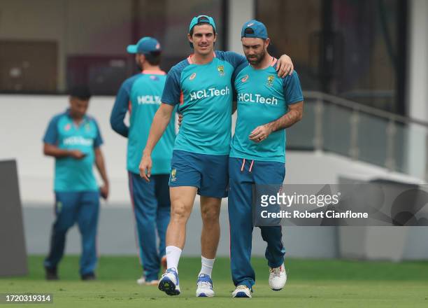 Sean Abbott and Glenn Maxwell of Australia are seen during an Australian training session during the ICC Men's Cricket World Cup India 2023 at at M....
