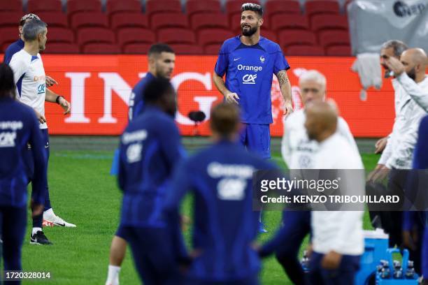 France's forward Olivier Giroud attends a training session at the Johan Cruijff stadium, in Amsterdam on October 12, 2023 on the eve of their UEFA...