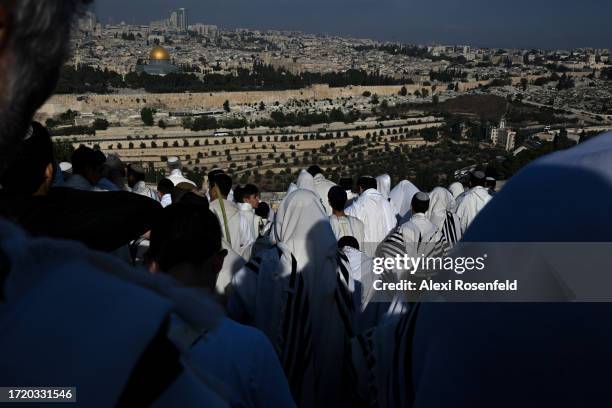 Orthodox Jews recite the Birkat HaCohanim, the Priestly Blessings, during Hoshana Rabbah, the seventh and final day of the Jewish holiday of Sukkot...