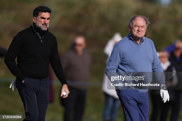 Golf Chairman, Yasir Al-Rumayyan interacts with Managing Director of The Old Course Hotel at St Andrews, Peter Dawson during Day Two of the Alfred...