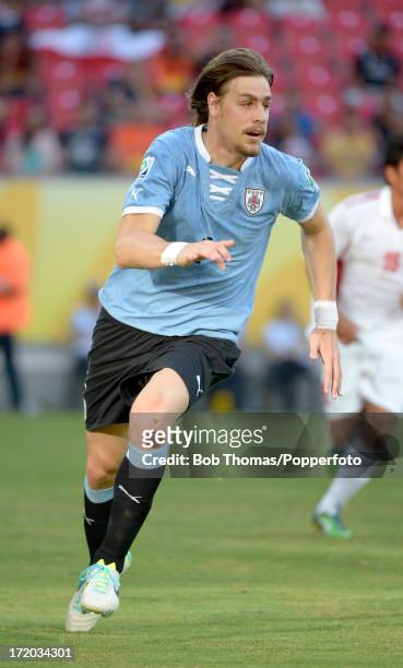 Sebastian Coates in action for Uruguay during the FIFA Confederations Cup Brazil 2013 Group B match between Uruguay and Tahiti at Arena Pernambuco on...