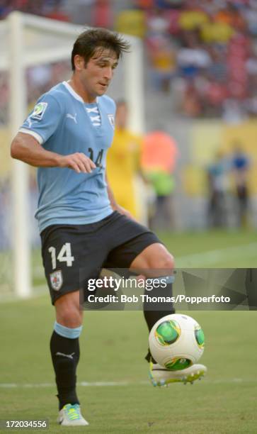 Nicolas Lodeiro in action for Uruguay during the FIFA Confederations Cup Brazil 2013 Group B match between Uruguay and Tahiti at Arena Pernambuco on...