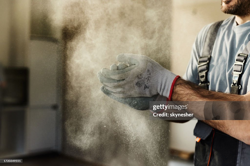 Cleaning dust from protective gloves!