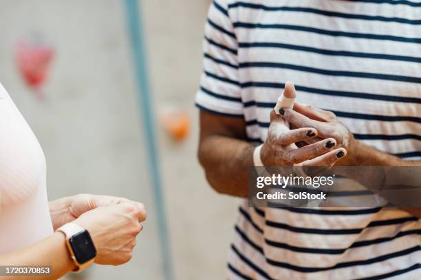 wrapped hands after climbing - chalk wall stock pictures, royalty-free photos & images
