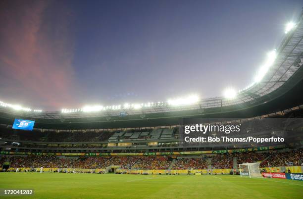 The stadium at sunset during the FIFA Confederations Cup Brazil 2013 Group B match between Uruguay and Tahiti at Arena Pernambuco on June 23, 2013 in...