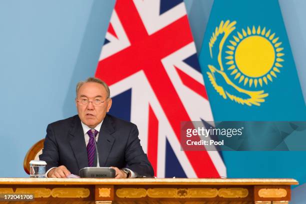 President Nursultan Nazarbayev makes a speech after signing a strategic partnership agreement with British Prime Minister David Cameron at the...